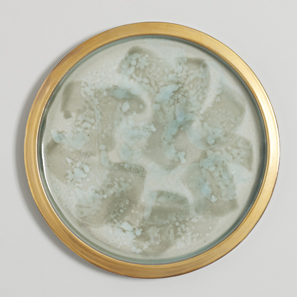 12 Porthole, Celadon, 105/8 in. (27 cm) in diameter, thrown porcelain, fired in reduction to 2336°F (1280°C), 10% gold luster. Photo: Jonathan Bassett.