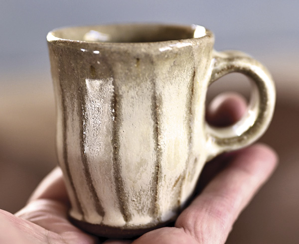 6 Lucy Fagella's Espresso cup, wheel-thrown and carved stoneware, glaze, fired and slow cooled in oxidation to cone 6.