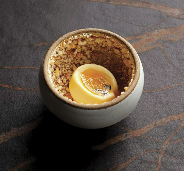 8 Jun Rhee's Egg bowl, red-brown stoneware, transparent glaze, fired in reduction to cone 10 in a gas kiln. Used at Sat Bains, a two Michelin star restaurant in Nottingham, UK. Photo: Sat Bains.