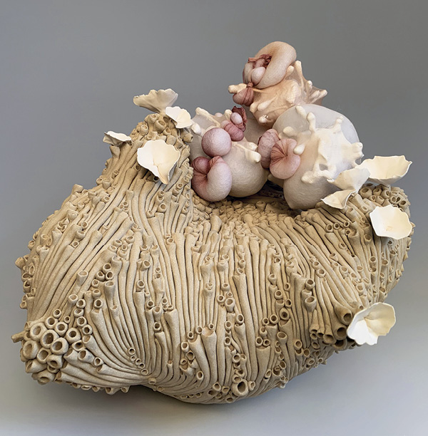 4 Keri Straka’s Internal Blooming, 16 in. (41 cm) in width, stoneware, porcelain, coil built, pinched, fired to cone 6 in oxidation, fabric, thread, 2022.