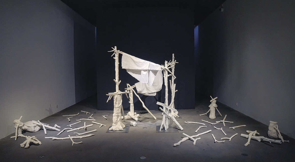 3 Patricia Glave’s The Shelter, 13 ft. (4 m) in height, shaped and molded porcelain, fabric, wire, iron, 2022. Photo: Simon Miraz.