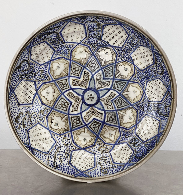 11 Geometric Star Plate, 10 in. (25 cm) in diameter, ceramic, fired to cone 10 in an electric kiln. Inspired by a 14th-century Ilkhanid bowl, Iran, sold by Sotheby’s. Photo: Asa Mader.