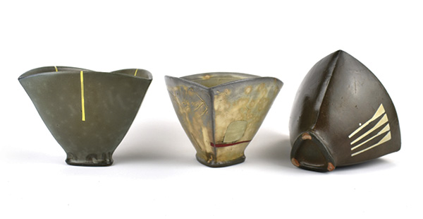 2 Tom Jaszczak’s tribowls, 7 in. (18 cm) in width, wheel-thrown and altered red earthenware, Creamy Slip variation, Creamy Slip, soda fired to cone 2, 2022.