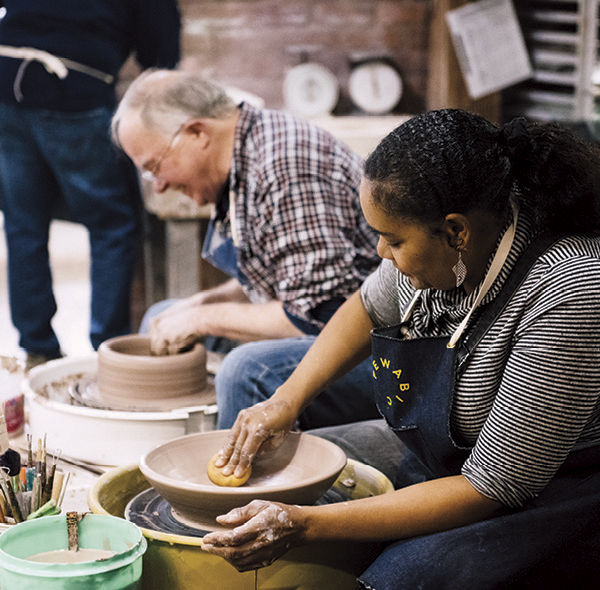 2 Chris and Michelle, students, throwing clay in the Pewabic Education Studio. Photo: EE Berger.