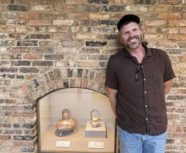 1 Joel Huff with his work on display at The Folk Pottery Museum of Northeast Georgia.