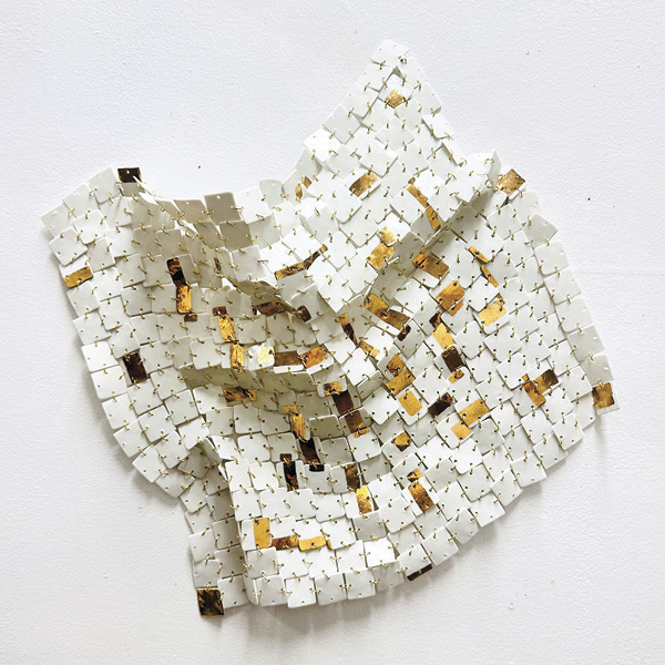8 Stepanka Summers’ wall piece, porcelain, gold luster, 2025.