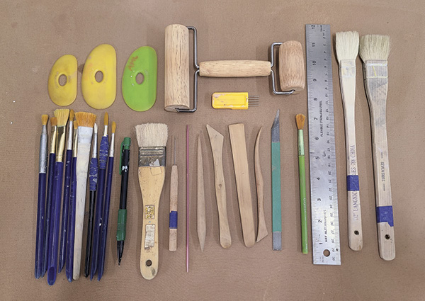 1 I use a selection of wooden modeling tools, brushes, flexible ribs, and carving tools.