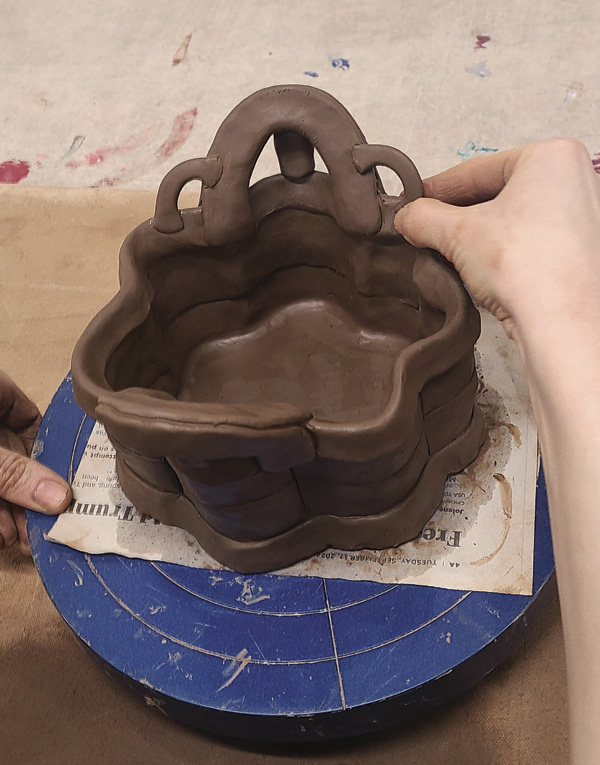 13 Roll out ¼-in. (6.4-mm)-thick coils, cut to 1–2 in. (2.5–5.1 cm), pinch to flatten, and attach.