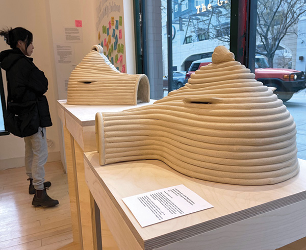 11 Jane Bamford’s Ceramic Little Penguin Nesting Modules, 25 in. (63.5 cm) in length, coil-built brown stoneware, 2024.