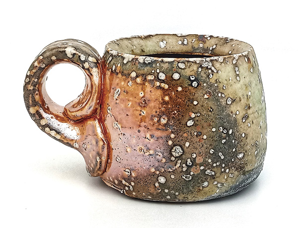 2 An espresso or Bialetti mug from a cone 10 reduction soda firing in which soda ash deposited from the right to the left.