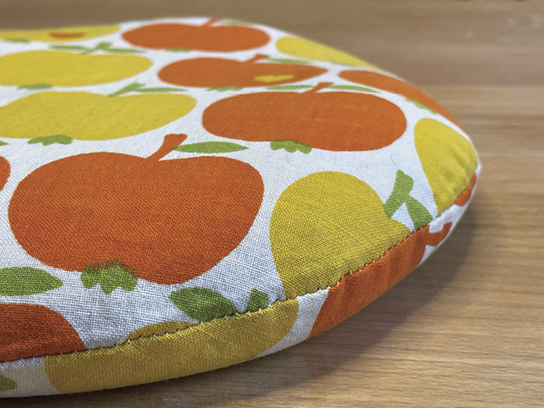 5 The finished plate weight, filled with sand. Sand is preferable to rice or beans because it is less likely to mold.