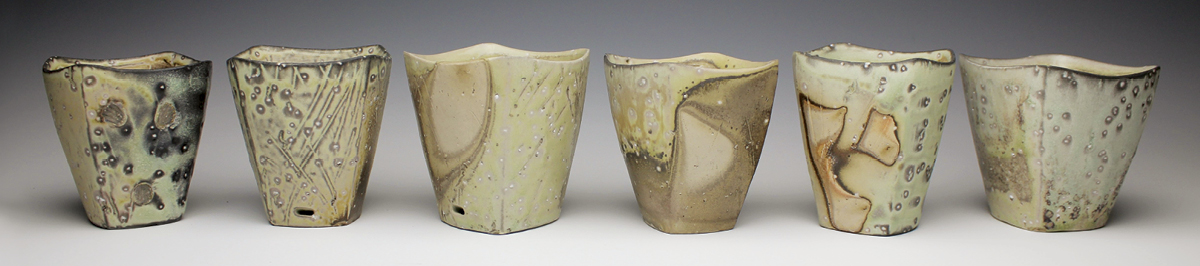 2 Cocktail cups, 4 in. (10 cm) in height (each), white stoneware, slip, fired to cone 11 in a soda kiln, 2023.