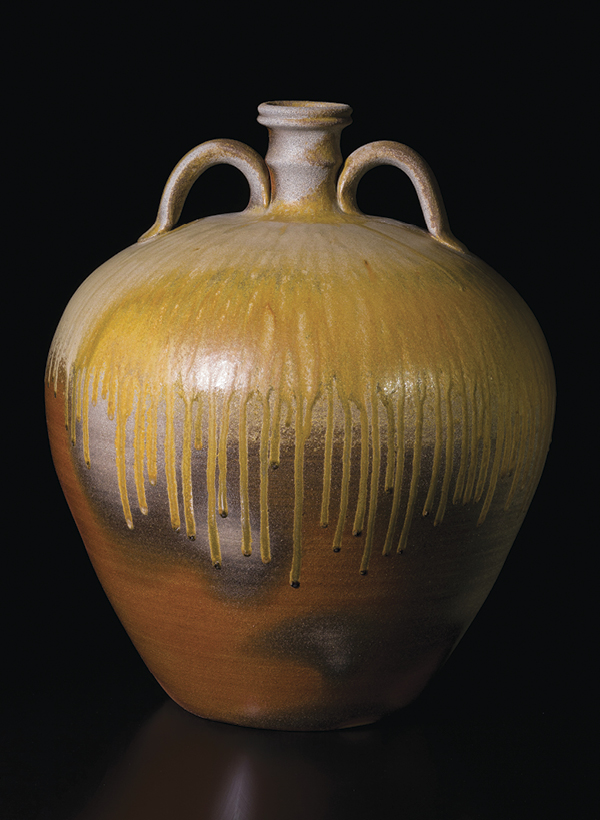 2 David Stuempfle’s double-handled jug, 24 in. (61 cm) in height, wheel-thrown stoneware, wood-ash glaze, wood fired to cone 13 in a cross-draft tube kiln, 2019. Photo: Jason Dowdle.
