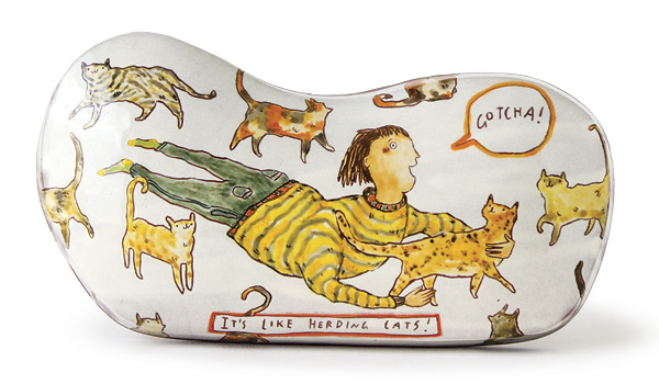 2 Celia Feldberg's It’s Like Herding Cats (wall hanging), 9 in. (22.8 cm) in width, earthenware, slip, underglaze, glaze, fired in oxidation to cone 03, 2025.