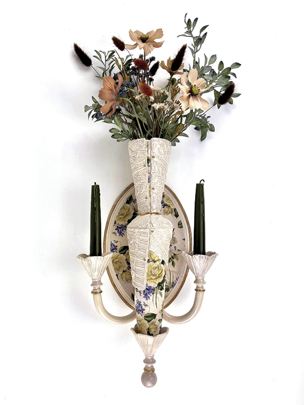 1 Marissa Childers’ candelabra, 16 in. (40.6 cm) in height, white stoneware, fired to cone 10 in a soda kiln, decal, luster, fired to cone 018.