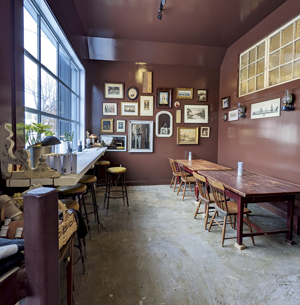 5 Decorated with vintage finds, the seating area of the café-boutique is welcoming.