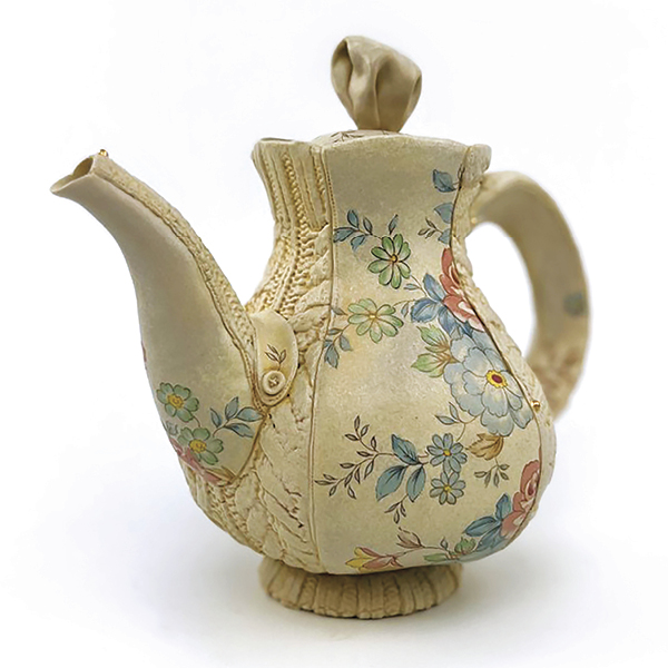 Teapot, 8 in. (20 cm) in height, porcelain, fired to cone 6 in an electric kiln, decal and luster fired to cone 018.