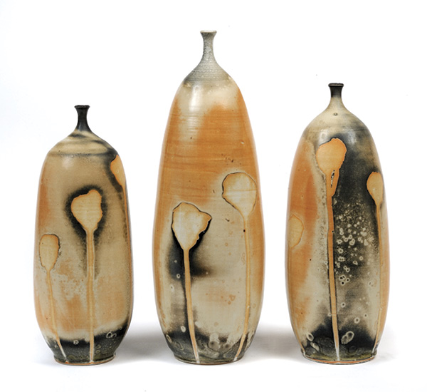 1 Bottles, to 13 in. (33 cm) in height, porcelain, Hicks Shino glaze, 2022. Photo: Gregory R Staley.