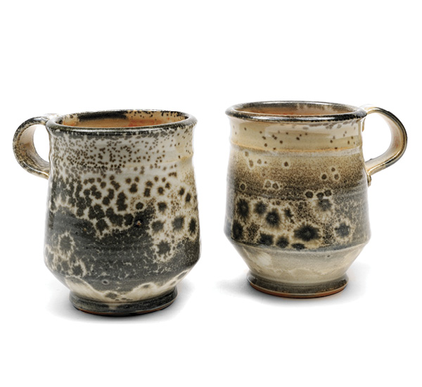 2 Cups, 3 in. (8 cm) in height each, porcelain, Hicks Shino glaze, 2022. Photo: Gregory R Staley.