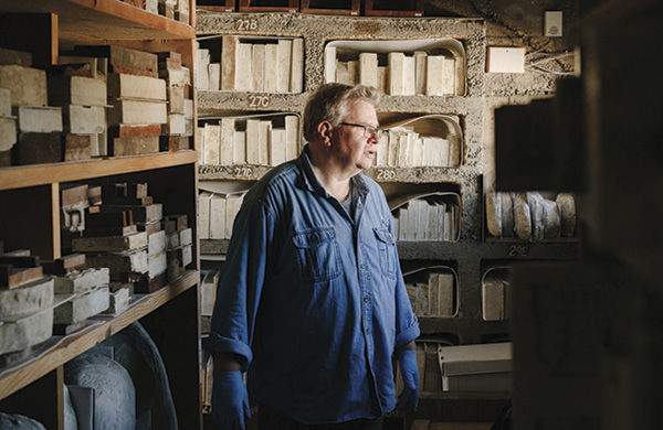 10 Vance Koehler, curator of the Tileworks of Bucks County, with the historic plaster mold collection. Photo: Bridge Street Creative.