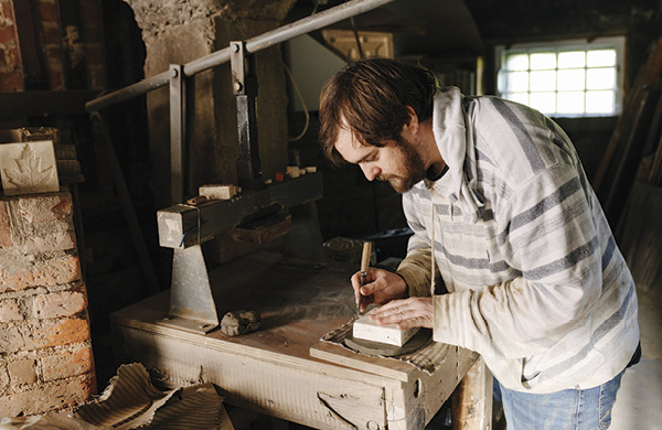 11 Chris Miterco cutting clay for tiles. Photo: Bridge Street Creative.