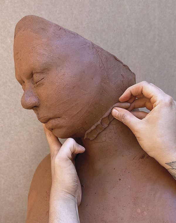 16 Slip and score the head in place, then reinforce the joint with coils on both the inside and outside to create a smooth transition to the neck.