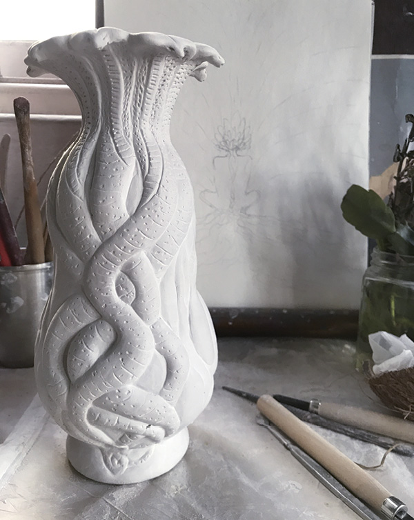 6 Carving a coiled porcelain Manasa Ghot form, 2020.