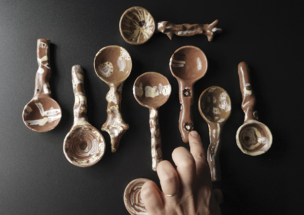 9 Spoons, slipped and glazed stoneware, gas fired to 2264° F (1240° C), 2021.