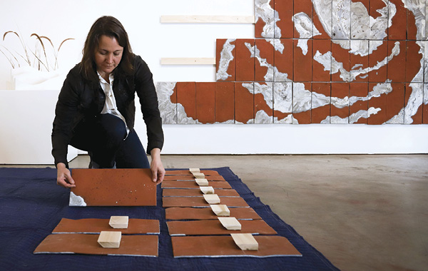 Kala Stein preparing work for an installation