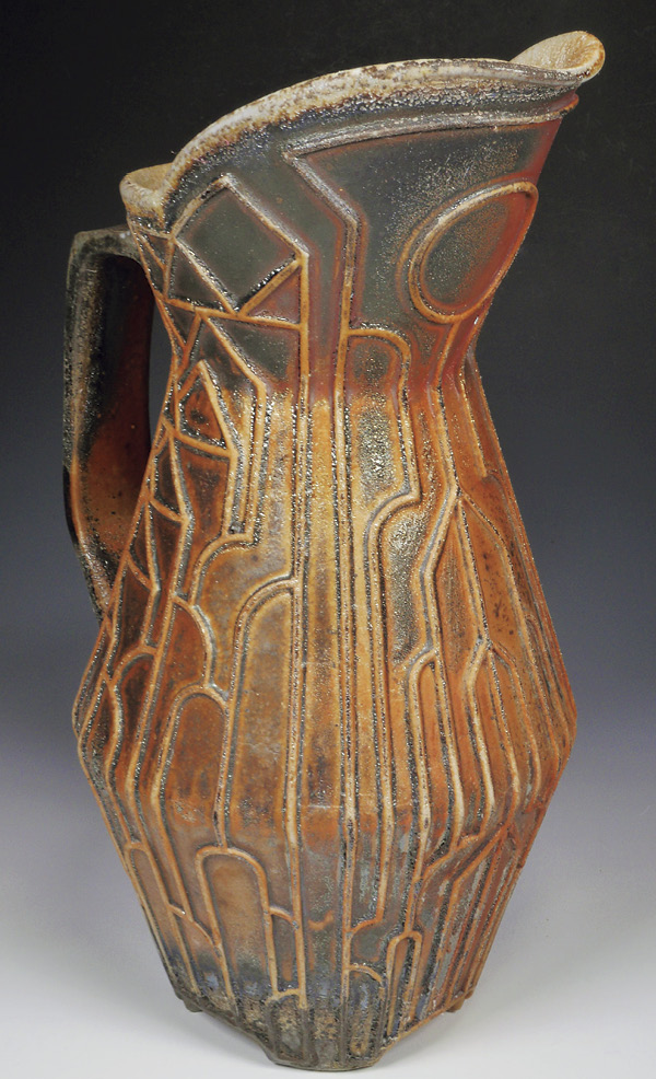 Benjamin Buchenot's Completed pitcher with texture mat decoration, stoneware, fired and cooled in reduction in a wood kiln, 2023.