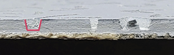 2 Close-up view of the carving, note the ‘V’ shape of the cut.