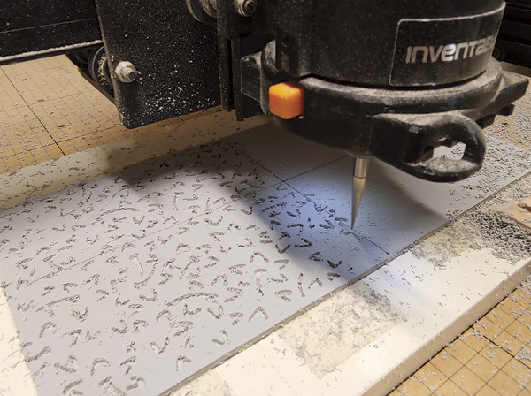 10 An all-over texture mat being carved by the X-Carve Milling Machine.