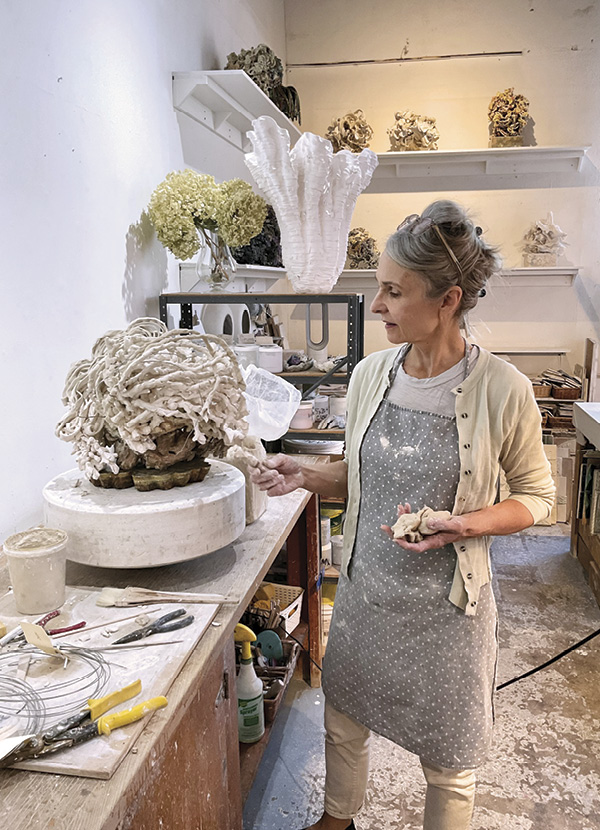 1 Susan Collett with Gust in her studio.