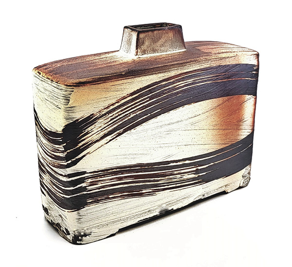 9 Sean O’Connell's Rectangular bottle, 11 in. (27.9 cm) in height, wheel-thrown and altered stoneware, slip, glaze, hand-painted with iron oxide, fired in reduction to cone 10 in a wood kiln, 2025.