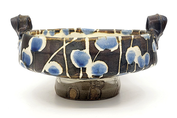 10 Sean O’Connell's Serving bowl, 12 in. (30.5 cm) in width, handbuilt stoneware, slip, glaze, hand-painted wax resist, fired in reduction to cone 10 in a wood kiln, 2024.