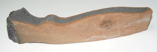 3 Black coring found in a high-iron clay body. Organic material has not been removed due to a lack of oxygen in the bisque-firing atmosphere.
