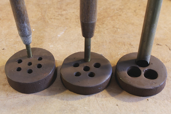 5 Using hole cutters of different diameters and arranging them together on one blank extrudes more coils at once.