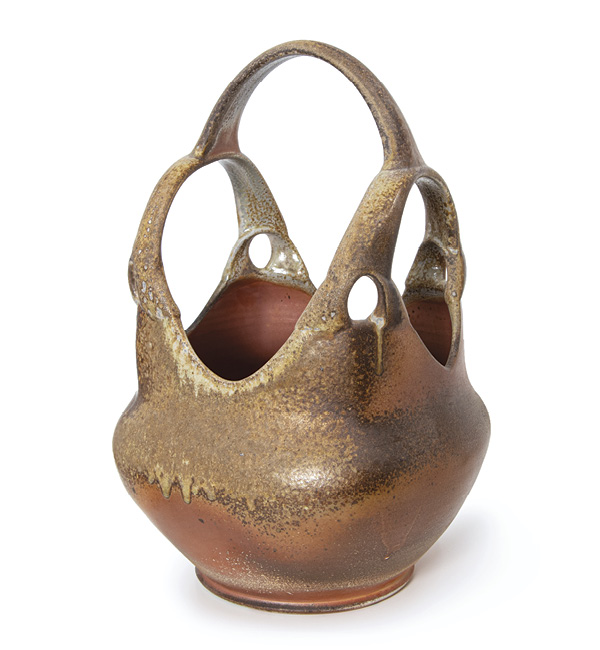 1 Tara Wilson’s Many Handled Basket, 15 in. (38 cm) in height, wheel-thrown ceramic, wood fired to cone 10. Photo: Silvia Palmer.