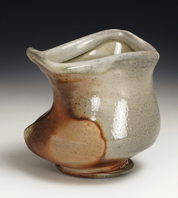 Ergonomic cup, 4 in. (10 cm) in height, white stoneware, wood fired to cone 12, 2021.