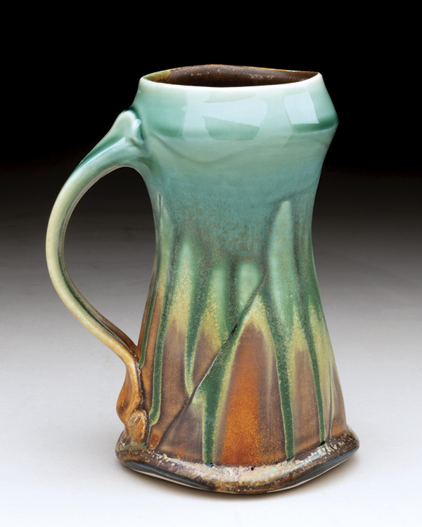 Steven Hill’s tankard, 7 in. (18 cm) in height, thrown-and-altered porcelain, pulled handle, multiple sprayed-and-layered glazes, fired to cone 8 in an electric kiln, 2023.