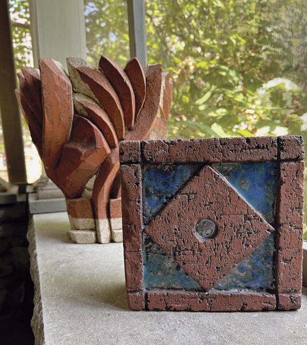 5 Carved pot and carved brick by Cary Esser, Chapel Hill, 1985–1996.