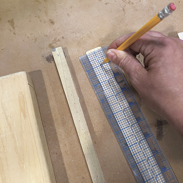 2 Use a quilting ruler to mark drill holes.