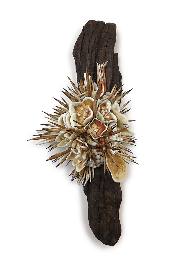 1 Lauren Hotson’s Quills and Petals No. 1, 12 in. (30.5 cm) in height, porcelain, glaze, fired to cone 10 in an anagama kiln, timber, echidna quills.