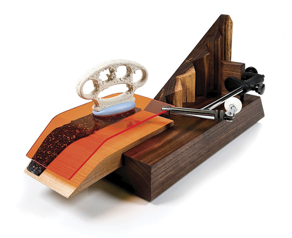 Wade MacDonald's Objects at the End No. 4 (An Elephant’s Foot), 18 in. (45.7 cm) in length, 3D-printed stoneware, underglazes, fired in oxidation to cone 05, wood, metal, resin, Plexiglas, rubber, glitter, 2022.