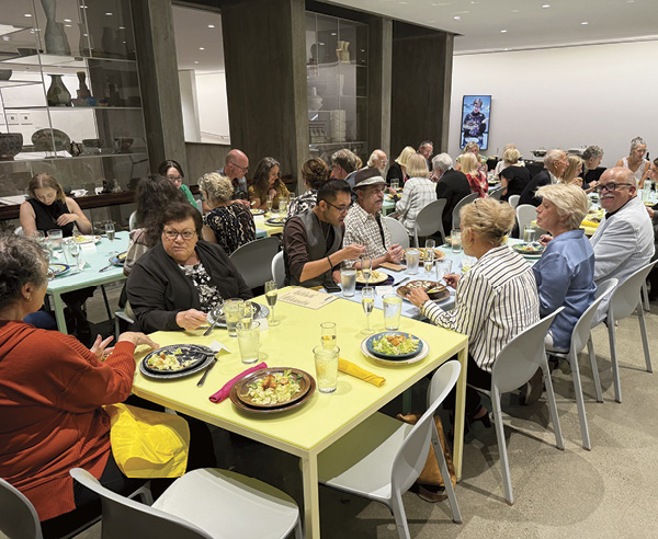 5 Tables reconfigured for special event at Louise Café.