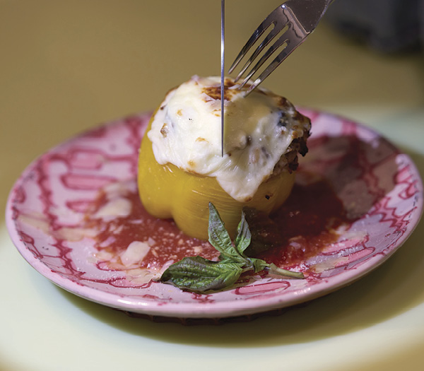 6 Jason Bige Burnett’s plate with a delicious brunch item consisting of pepper, tomato jam, basil, poached egg, and secret ingredients.