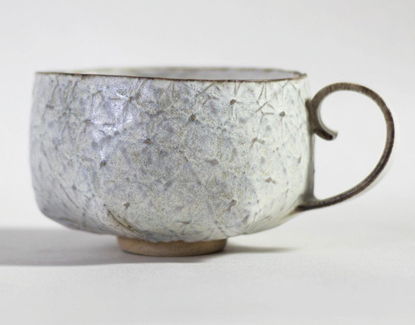 26 The finished cup after the bisque and glaze firings.