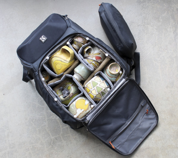1 The camera backpack fully opened from the front, with packed pottery easily displayed and accessible.