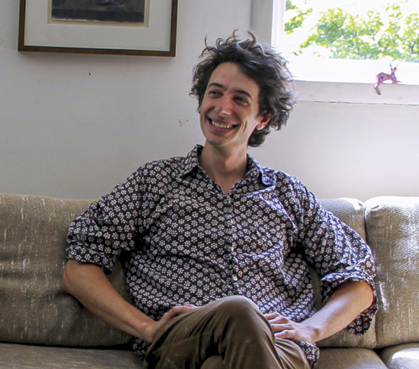 1 Portrait of Maxwell Mustardo in the Takaezu Studio living room, 2024. Photo: Charles Talbot.