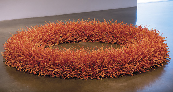 1 Bean Finneran’s Orange Ring, 8 ft. (2.4 m) in diameter, earthenware, glaze, acrylic stain, 2022.